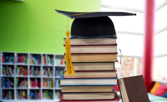 books and graduation hat in education library 2021 08 30 06 00 28 utc